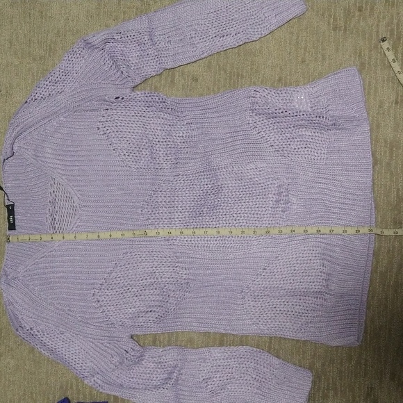 M/l lavender is the color, unique is the brand, it is definitely oversized. - Picture 2 of 5